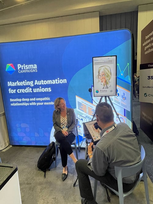 Prisma's booth at GAC 2024 featuring a Caricaturist